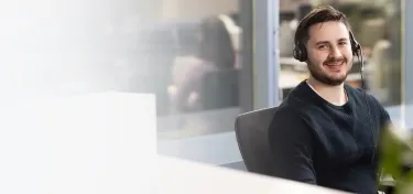 Call centre staff smiling